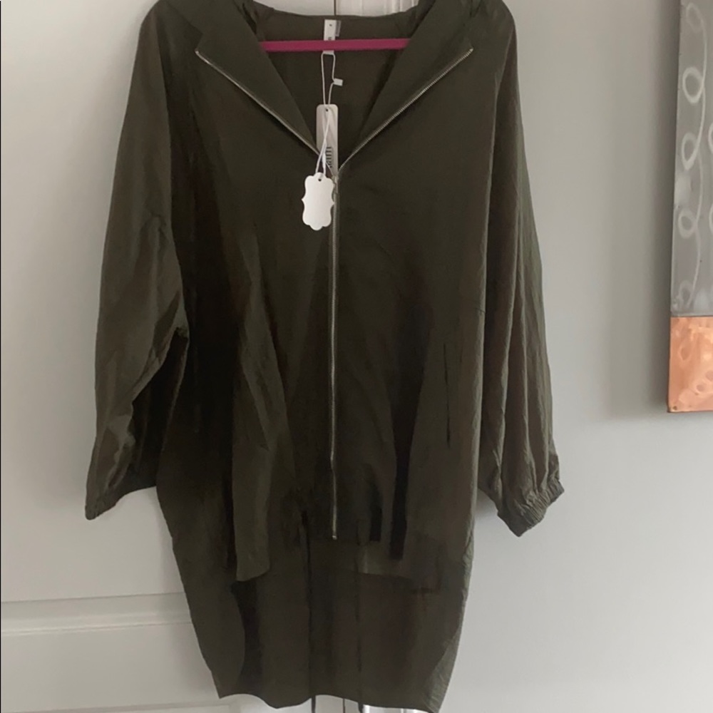 Windbreaker hi-lo style-longer back. Drawstring